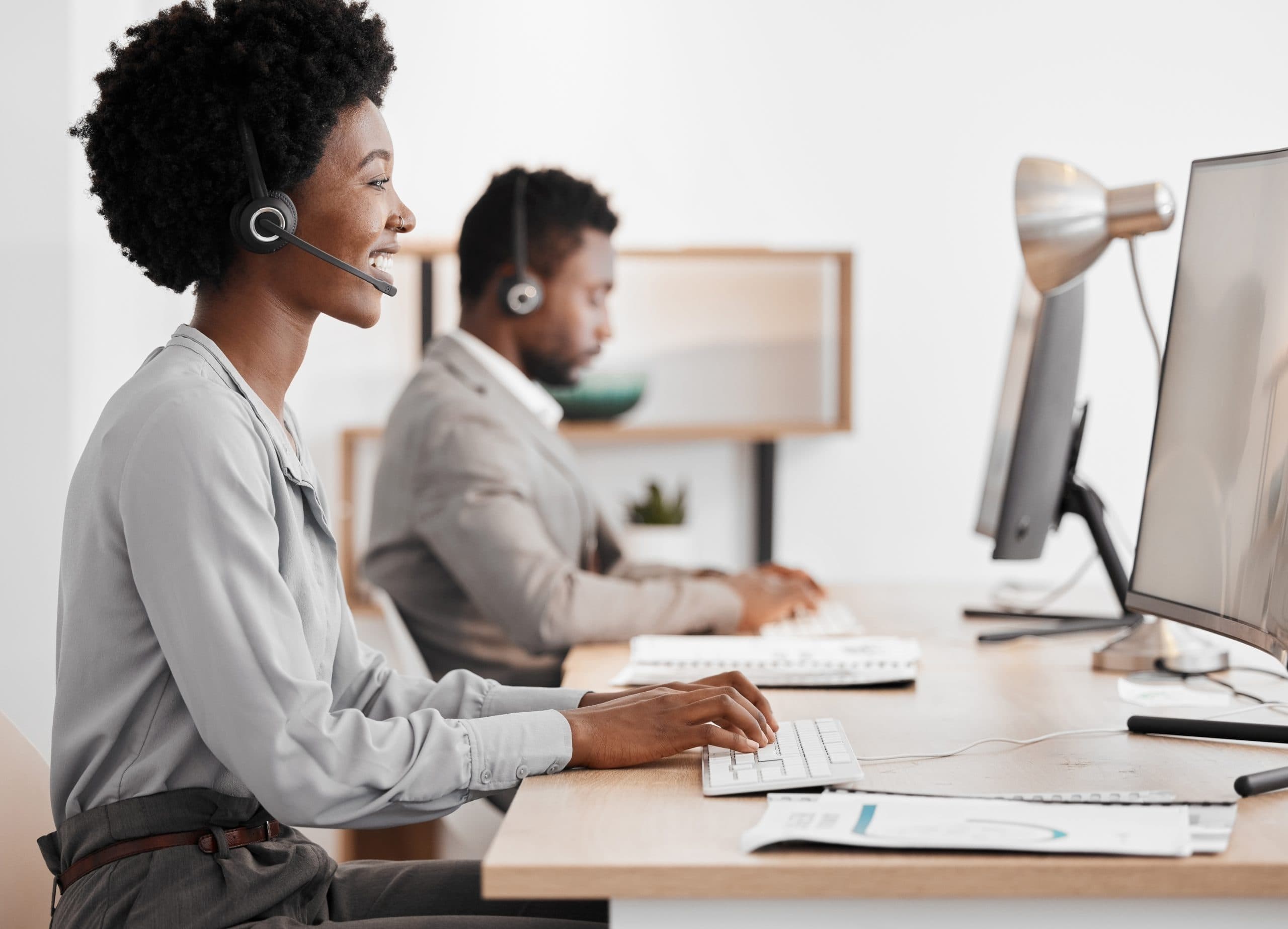 Sales woman, call center agent and customer service support employee for advice, help and expert communication working on office computer. Young internet consultant, crm telemarketing and contact us