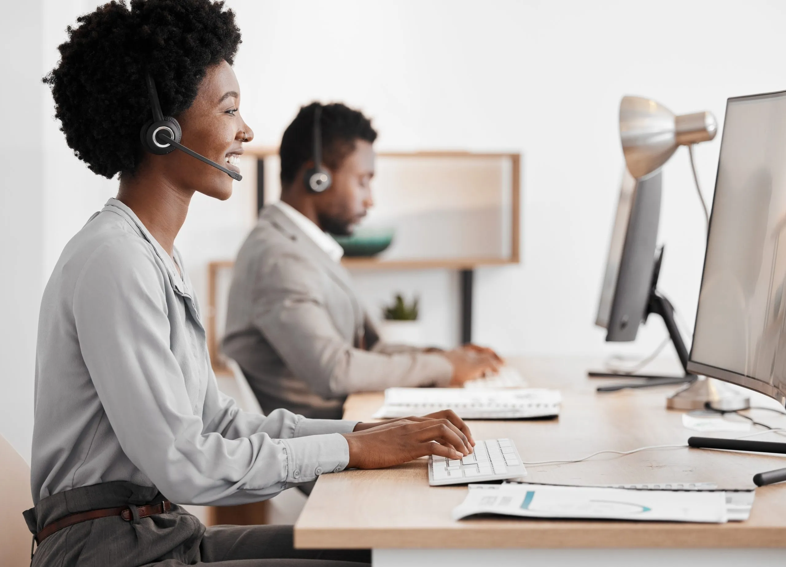 Sales woman, call center agent and customer service support employee for advice, help and expert communication working on office computer. Young internet consultant, crm telemarketing and contact us